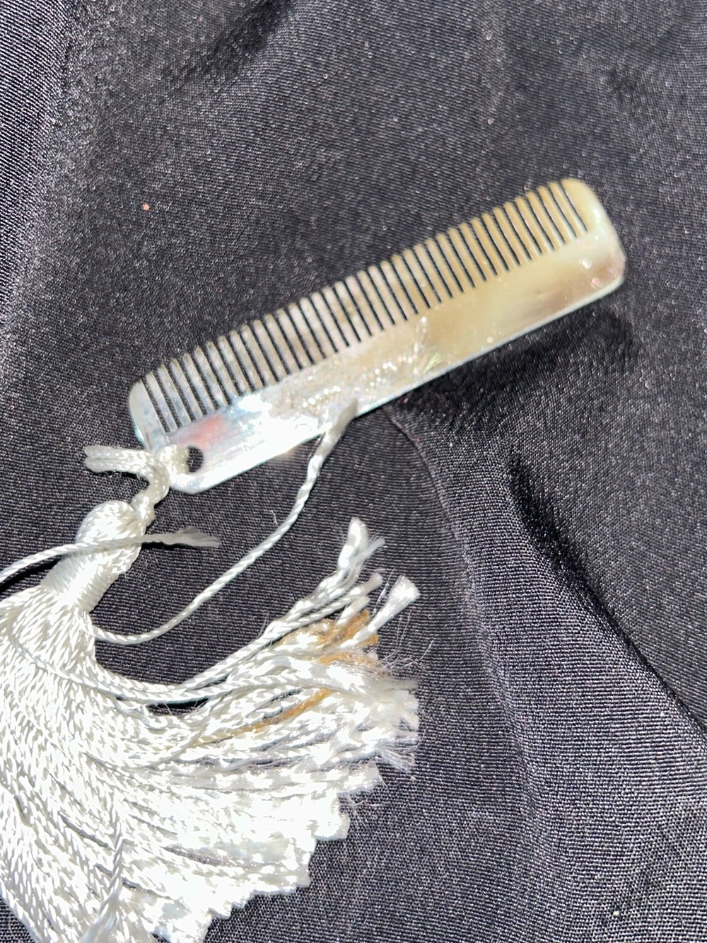 Judith Leiber Ivory Pocket Comb with Silver Tassel
